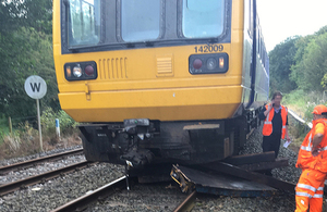 Collision between passenger train and equipment near Clapham